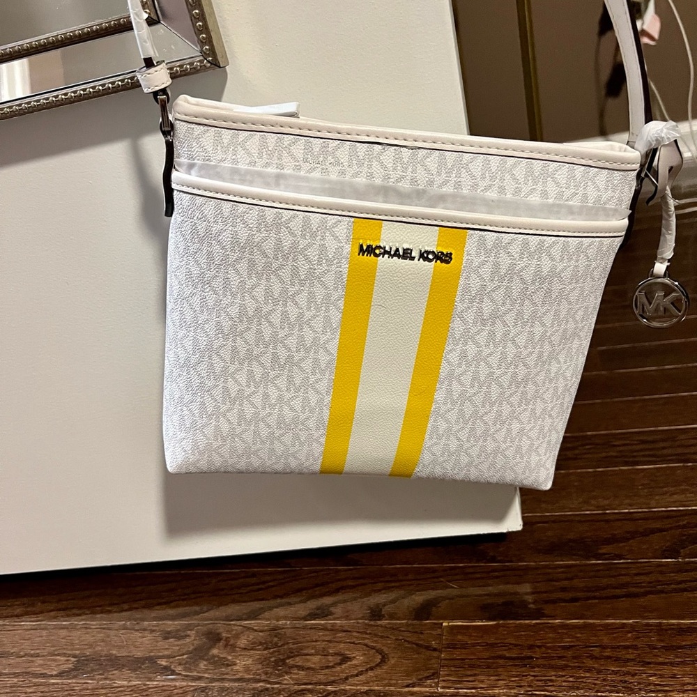 Never before used beautiful white & yellow Michael Kors Crossbody Bag